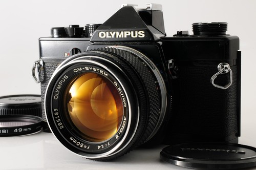 Near mint olympus - [near, black